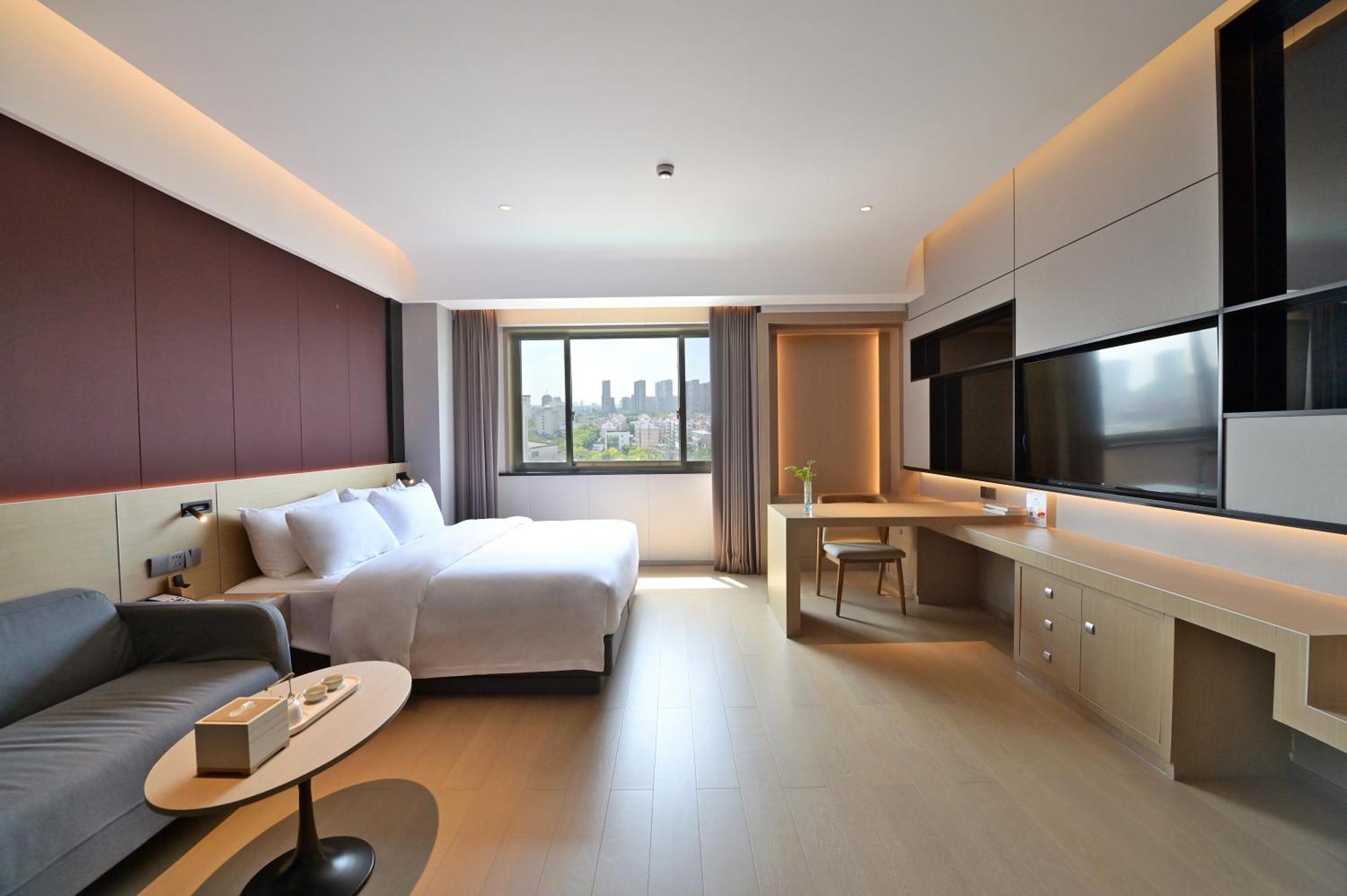 Maison New Century Tongxiang Exterior photo